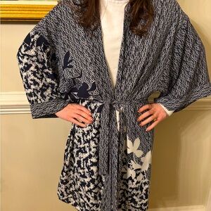 Beautiful wrap to wear as coverup or over cute tank!
